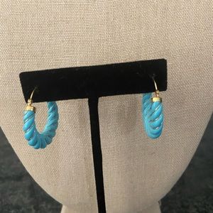Turquoise and gold earrings.